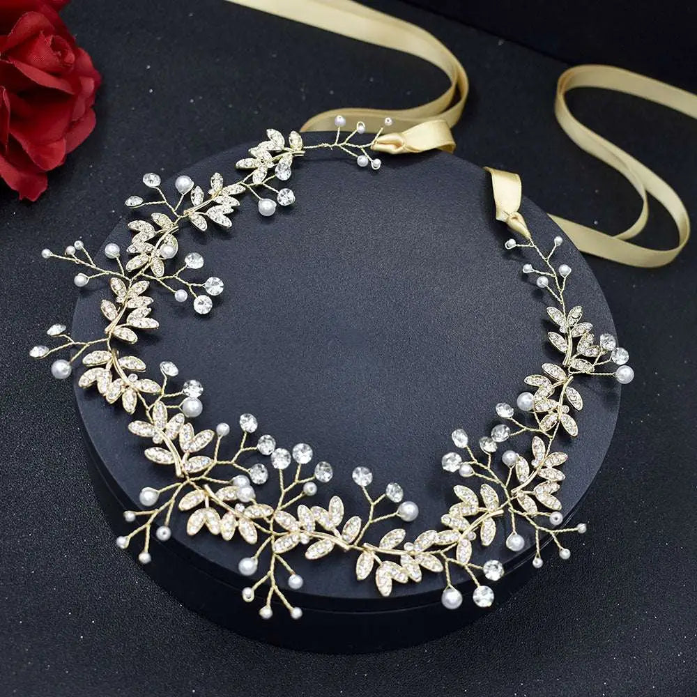 Gold-toned bridal hair band with silver leaf pearl and rhinestone alloy accented vine design for elegant occasions