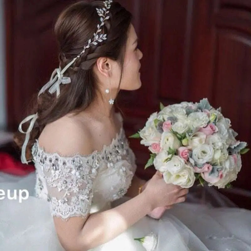 Delicate silver leaf protein rhinestone headdress hair band adorned with sparkling rhinestones and white ribbon tie