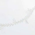 Silver leaf protein rhinestone headdress featuring a delicate silver vine with clear faceted crystals for hair decoration