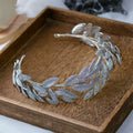 Silver leaf zircon alloy hair band featuring a silver leaf crown adorned with sparkling artificial zircon rhinestones