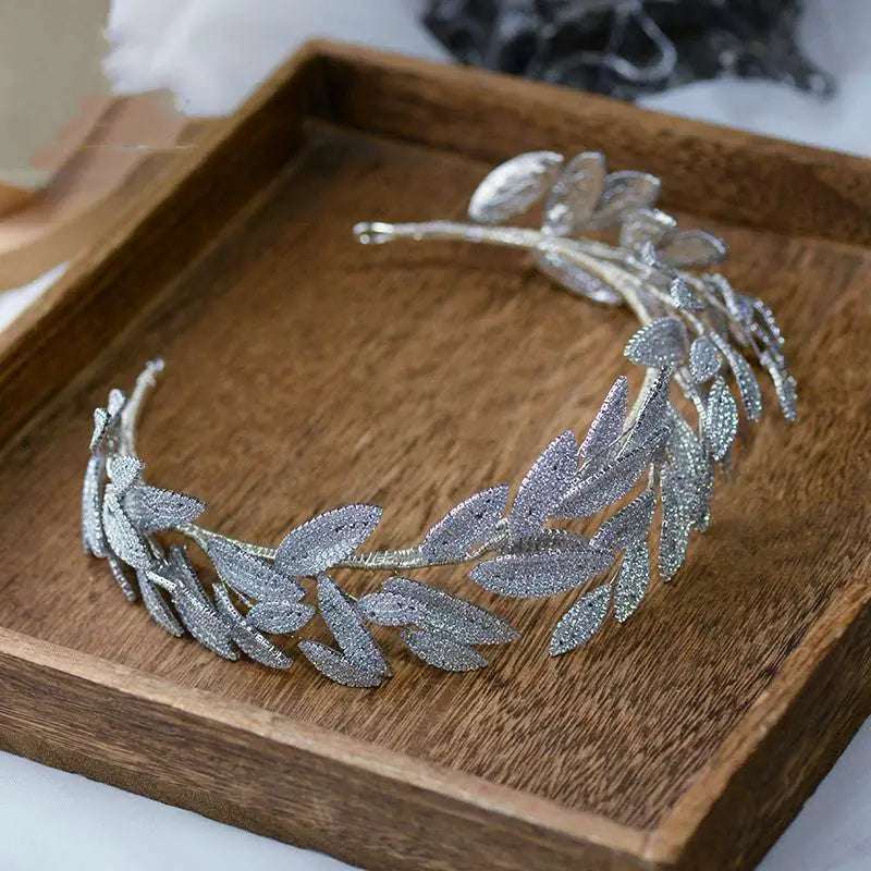 Silver leaf zircon alloy hair band with sparkling artificial rhinestones in a silver leaf crown design
