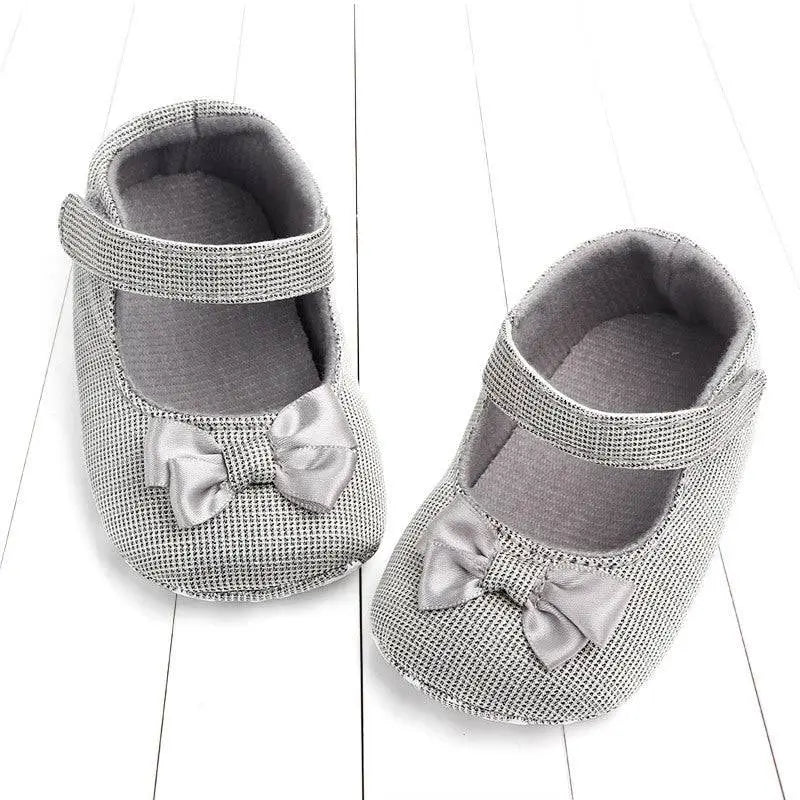 Silver mesh princess shoes bow for babies featuring a matching satin bow on the front