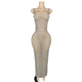A shimmering silver metallic niche princess banquet dress with a beaded bodycon design and square neckline with thin straps