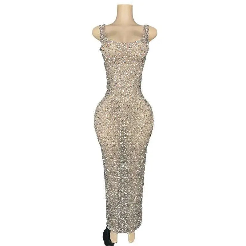 A shimmering silver metallic niche princess banquet dress with a beaded bodycon design and square neckline with thin straps