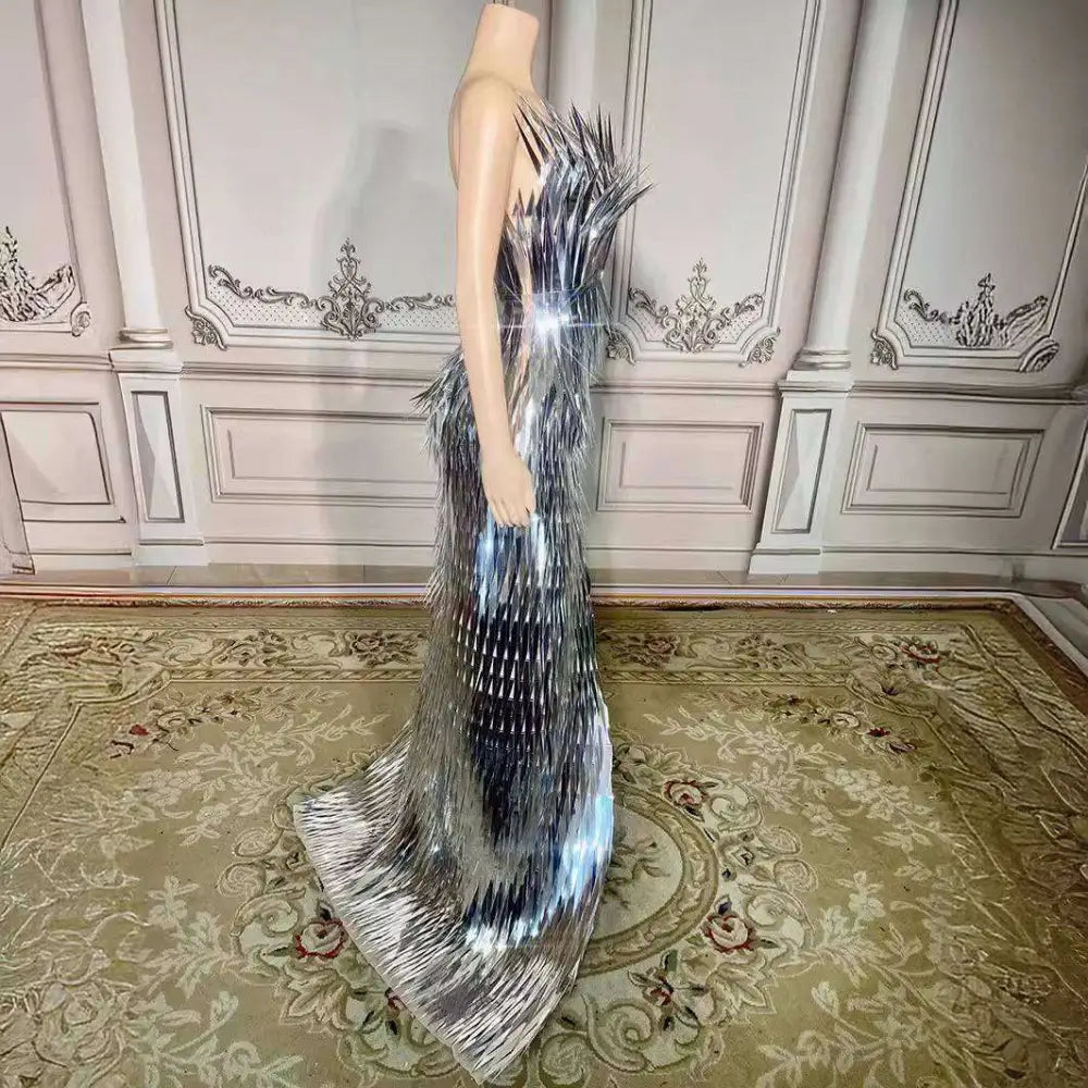 Silver metallic sequined luxury evening dress with shimmering feather texture and cascading fringe for stage advanced light use