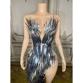Silver metallic sequined luxury evening dress with shimmering feather-like texture, plunging v-neckline, and high slit for stage advanced light use