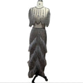 Silver nude feathered two-piece evening dress with a sheer embellished top and layered feathered skirt
