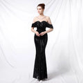 Black sequined off-the-shoulder mermaid gown with ruffled sleeves and fitted silhouette for elegant occasions
