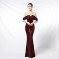 Silver off-the-shoulder sequined long dress in shimmering burgundy with fitted bodice and flowing mermaid skirt