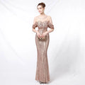 Silver off-the-shoulder sequined long dress with shimmering rose gold mermaid gown and sheer mesh detailing