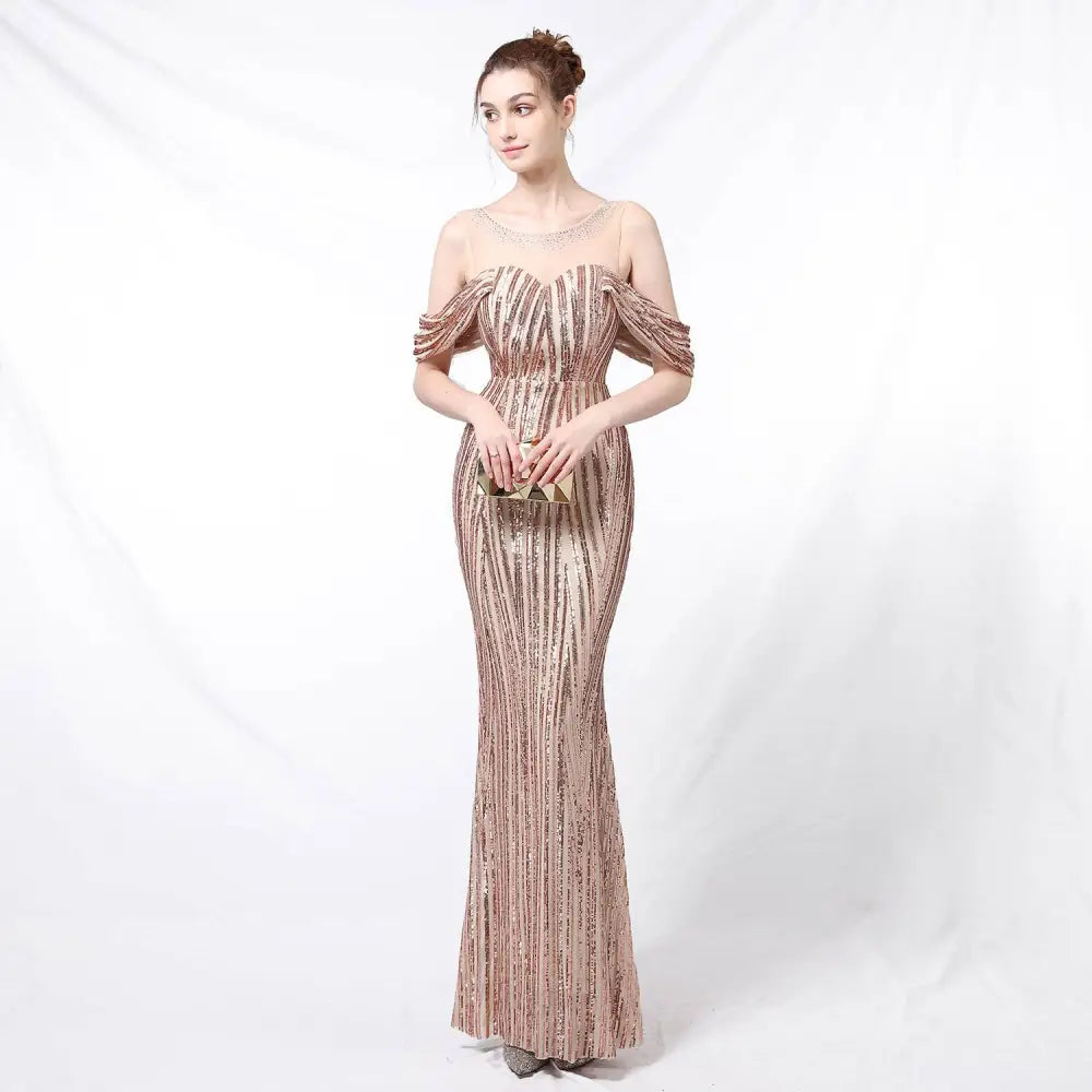 Silver off-the-shoulder sequined long dress with shimmering rose gold mermaid gown and sheer mesh detailing