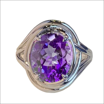 Silver oval amethyst ring featuring a large purple stone and intricate braided metal band for fashion amethyst style