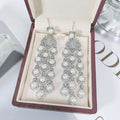 Elegant silver pearl micro inlay zircon style beaded fringe earrings with cascading white pearls and crystal settings