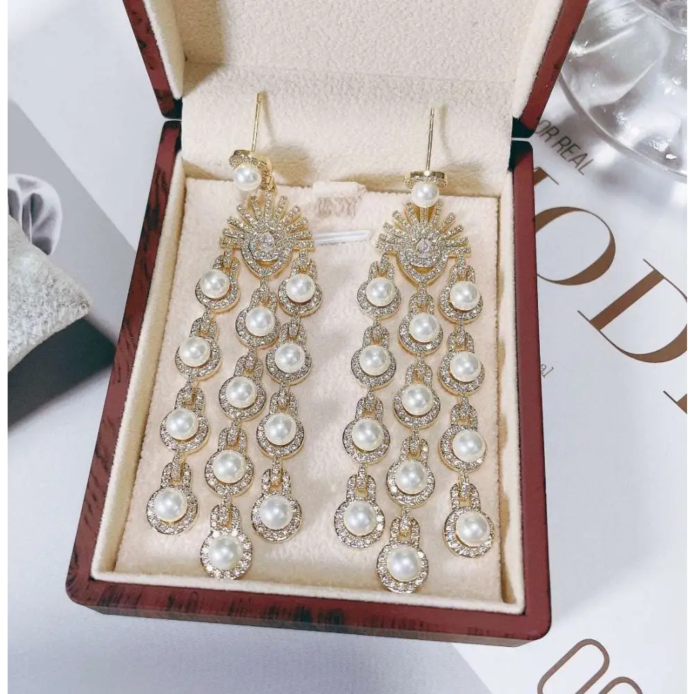 Elegant gold-toned chandelier earrings with silver pearl micro inlay zircon and zircon style beaded fringe details