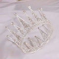 Silver retro round bridal crown crafted from sparkling silver alloy with clear crystals and intricate filigree detailing
