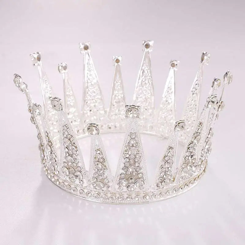 Silver retro round bridal crown with sparkling silver alloy and clear crystals featuring intricate filigree detailing