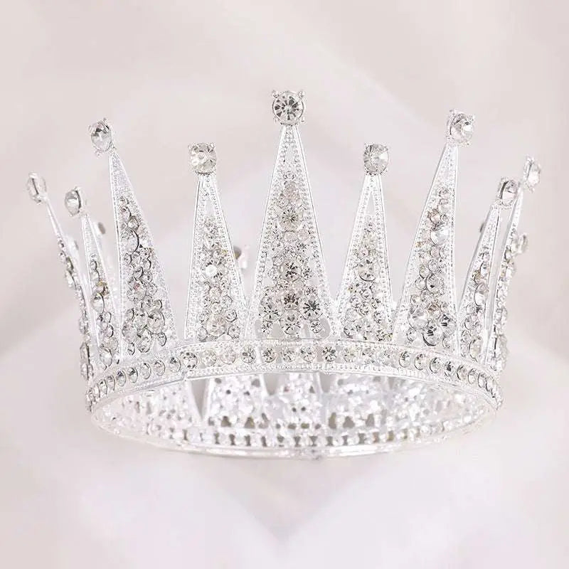Silver retro round bridal crown made of sparkling silver alloy with clear crystals and intricate lace-like metalwork