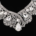 A sparkling silver rhinestone Korean super alloy necklace with clear teardrop and round crystals in an ornate design
