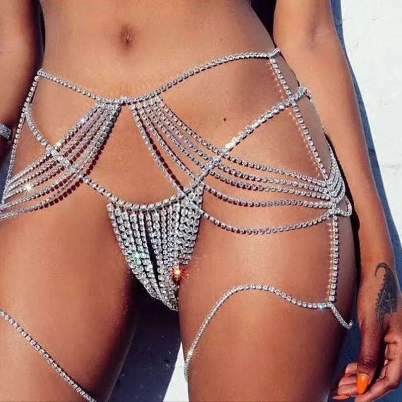 Shimmering silver rhinestone waist chain jewelry featuring an intricate beaded design for elegant wear