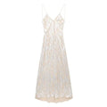 A shimmering silver satin metal foil printed underwear dress with delicate thin straps and subtle textured pattern