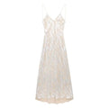 A shimmering silver satin metal foil printed underwear dress with delicate spaghetti straps and subtle texture
