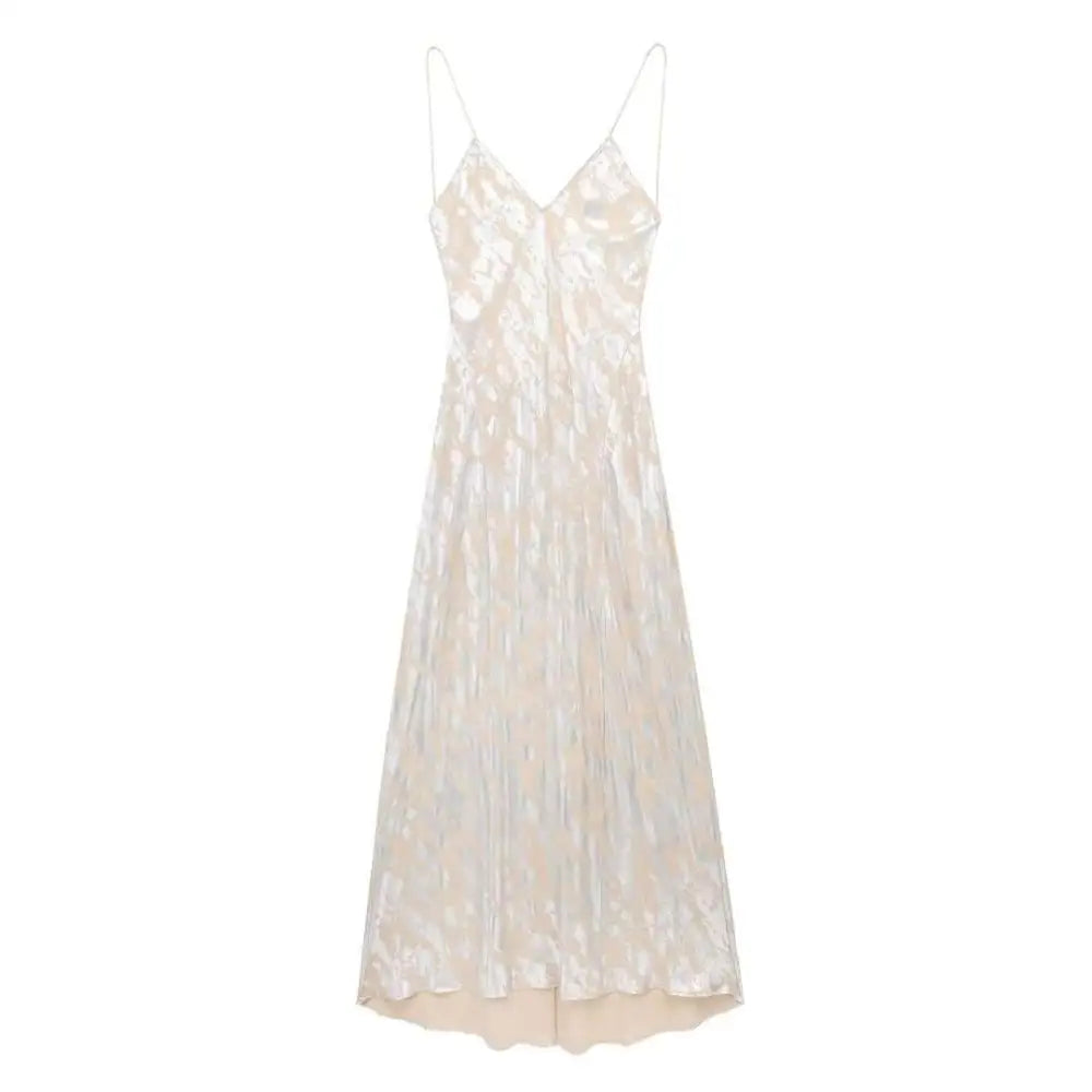 A shimmering silver metal foil printed underwear dress in ivory satin with delicate spaghetti straps and subtle texture