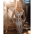 Silver sequined banquet evening dress featuring a form-fitting geometric cutout design for sprinkled gold banquet events
