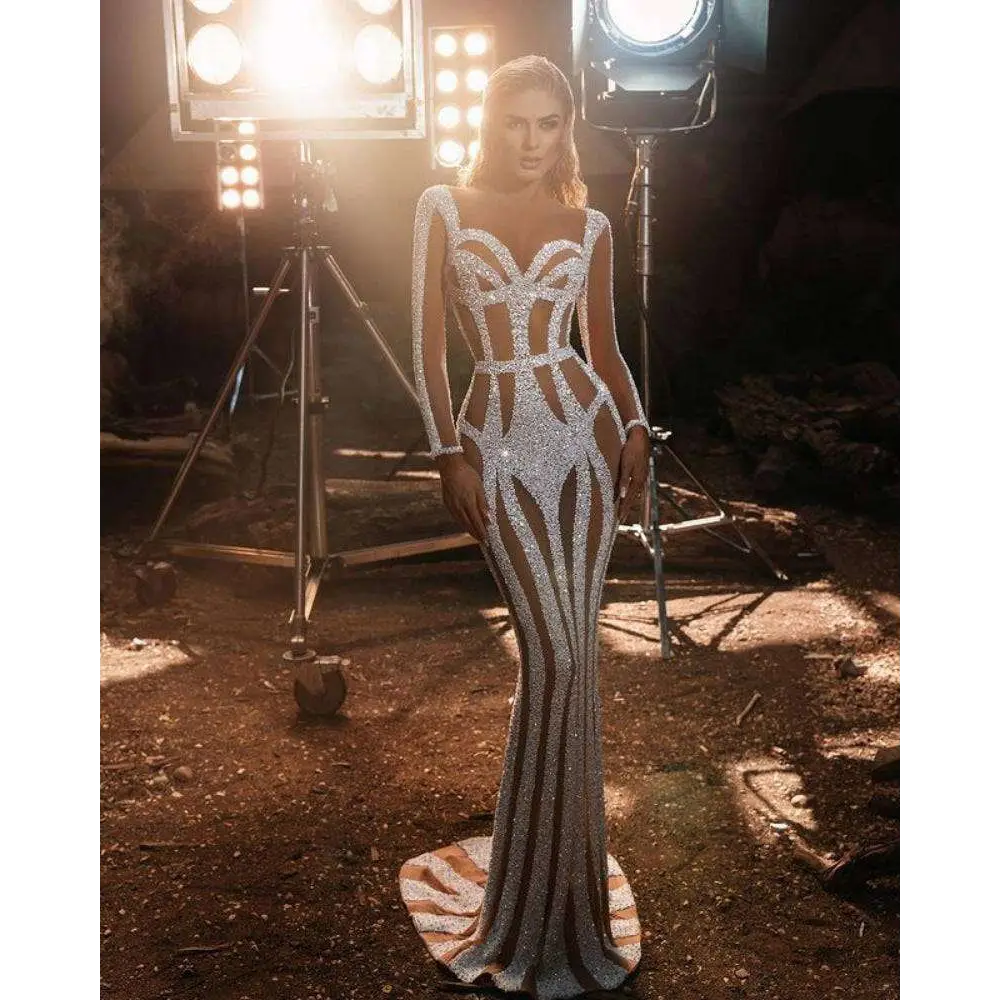 Silver sequined form-fitting banquet evening dress with geometric cutouts for a sprinkled gold banquet event