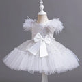 Silver sequined wedding dress tulle skirt with white sequined tutu, feathered shoulders, and satin bow at the waist