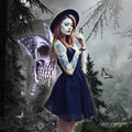 A woman wearing silver skull halloween butterfly wings with white skull-patterned butterfly wings flowing holds a small butterfly