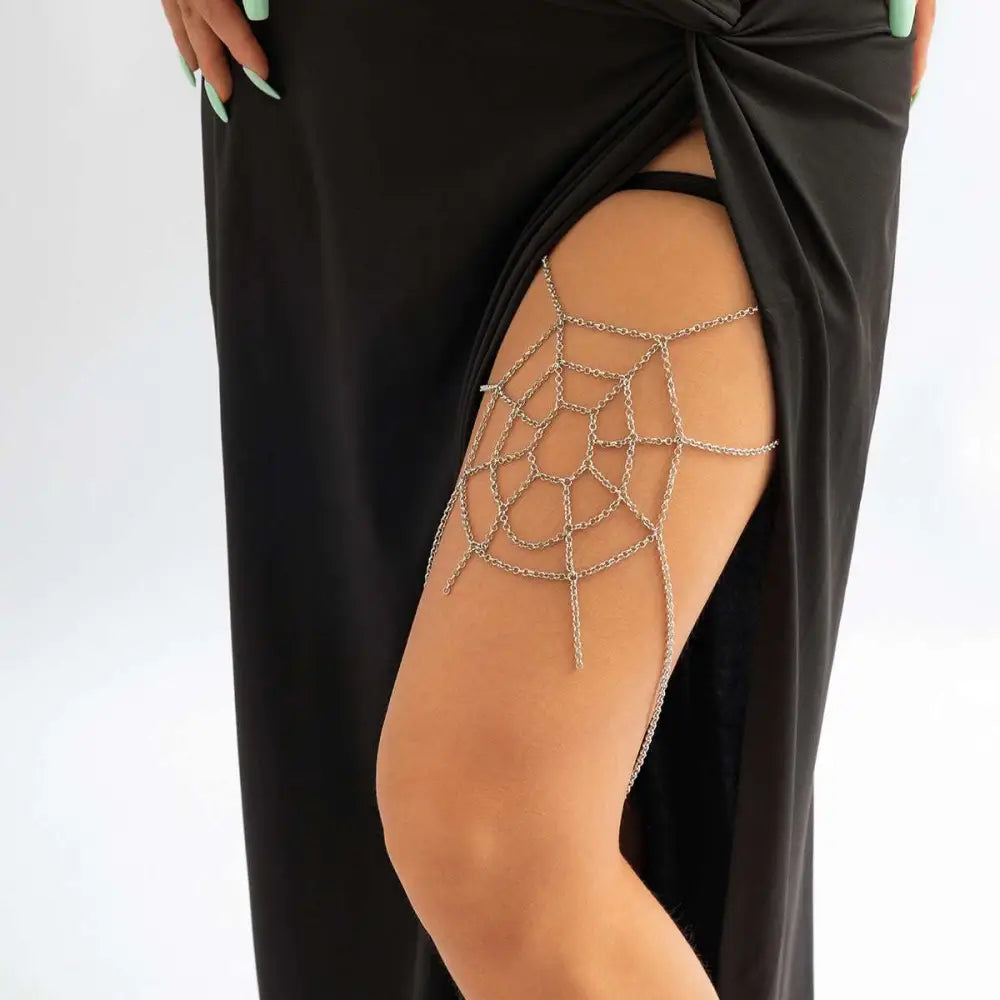 Silver spiderweb geometric body chain thigh garter made of silver chain with a spiderweb design for stylish wear