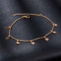Gold-toned star fashion anklet featuring a delicate silver chain and clasp in elegant anklet jewelry design