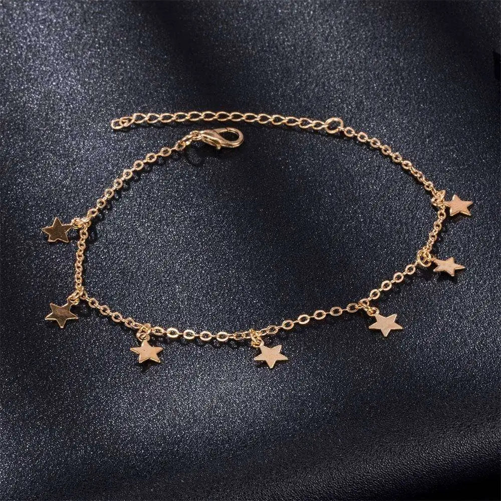 Gold-toned star fashion anklet featuring a delicate silver chain and clasp in elegant anklet jewelry design