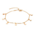 Gold-toned star charm anklet jewelry featuring a delicate silver chain and lobster clasp for star fashion anklet style