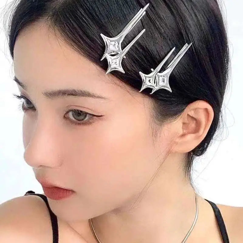 Silver star y2g star hairpin with clear stones featuring sharp angular designs and embedded crystals for stylish wear