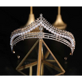 Silver bridal crown featuring baroque pearls and diamonds with a starburst design in a crown baroque style