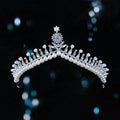 Silver starburst bridal crown baroque pearl tiara with sparkling silver, white pearls, clear crystals, and floral motif centerpiece