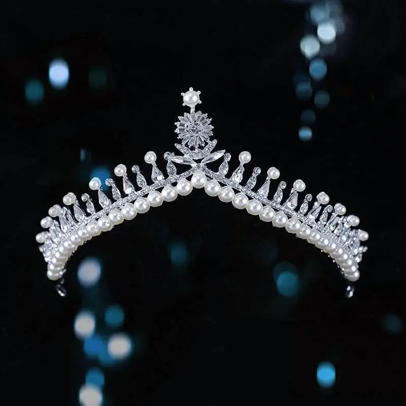 Silver starburst bridal crown baroque pearl tiara with sparkling silver, white pearls, clear crystals, and floral motif centerpiece