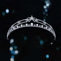 Silver starburst bridal crown baroque pearl tiara adorned with sparkling crystals and delicate white pearls