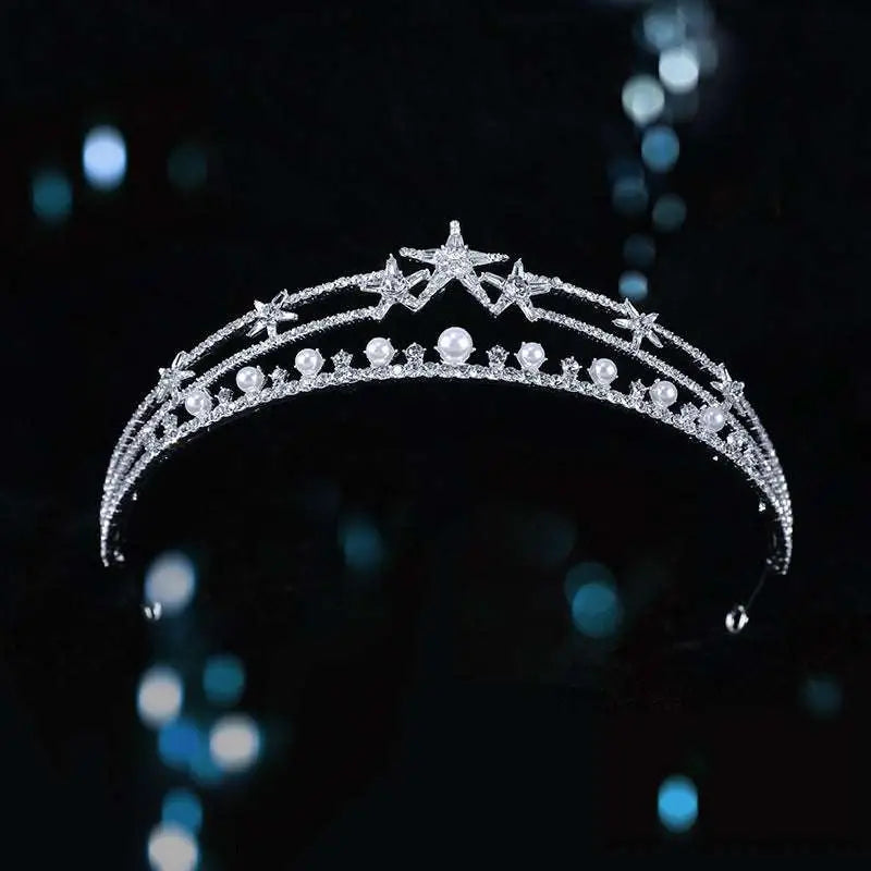 Silver starburst bridal crown baroque pearl tiara adorned with sparkling crystals and delicate white pearls