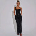 A sleek black drill suspenders gown with silver strap sequins net and square neckline for elegant occasions