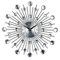 Silver sunburst mute wall clock with black metal rays and sparkling crystal accents for living room decor