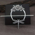 Silver-toned female viking barrettes with ornate circular design featuring sunflowers and a detailed dragonfly pendant