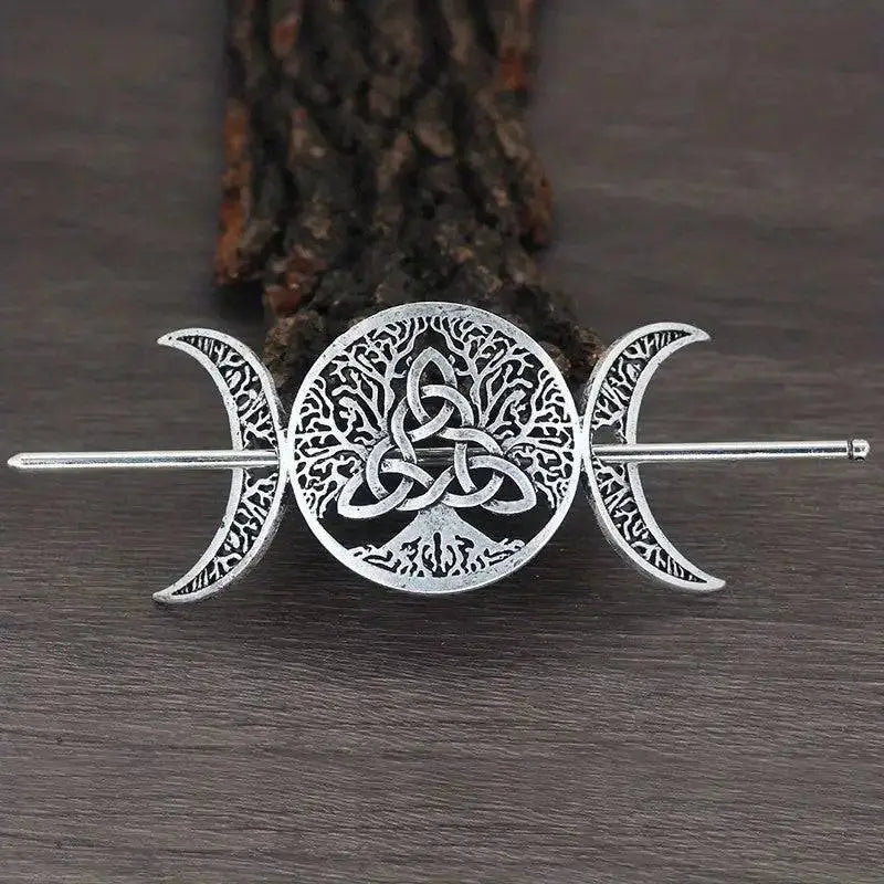 Silver-toned female viking barrettes featuring an intricate tree of life celtic knotwork with crescent moons design