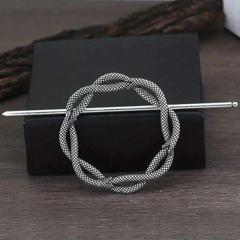 Silver viking barrettes featuring a twisted woven mesh design in silver-toned female viking alloy style
