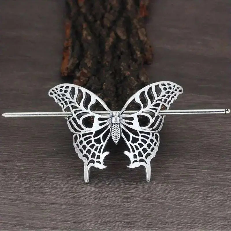 Silver-toned female viking barrettes featuring a silver butterfly hairpin with intricate lace-like wings and slender alloy pin