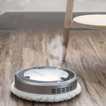 Silver white intelligent automatic sweeping robot with a soft fluffy cleaning pad and blue microfiber cleaning surface
