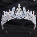 Silver white leafy opal and crystal bridal crown featuring an ornate design with light blue opal stones and clear crystals