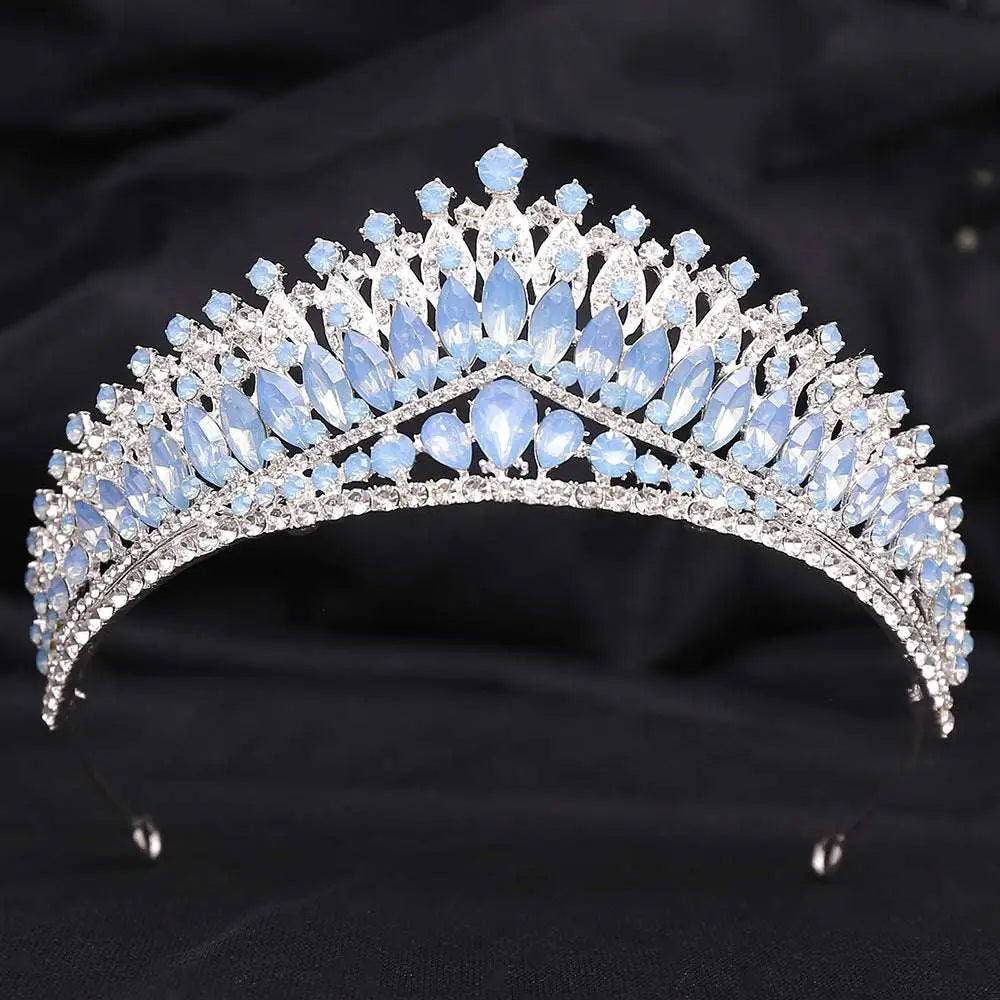 Silver white leafy opal and crystal bridal crown featuring an ornate design with light blue opal stones and clear crystals