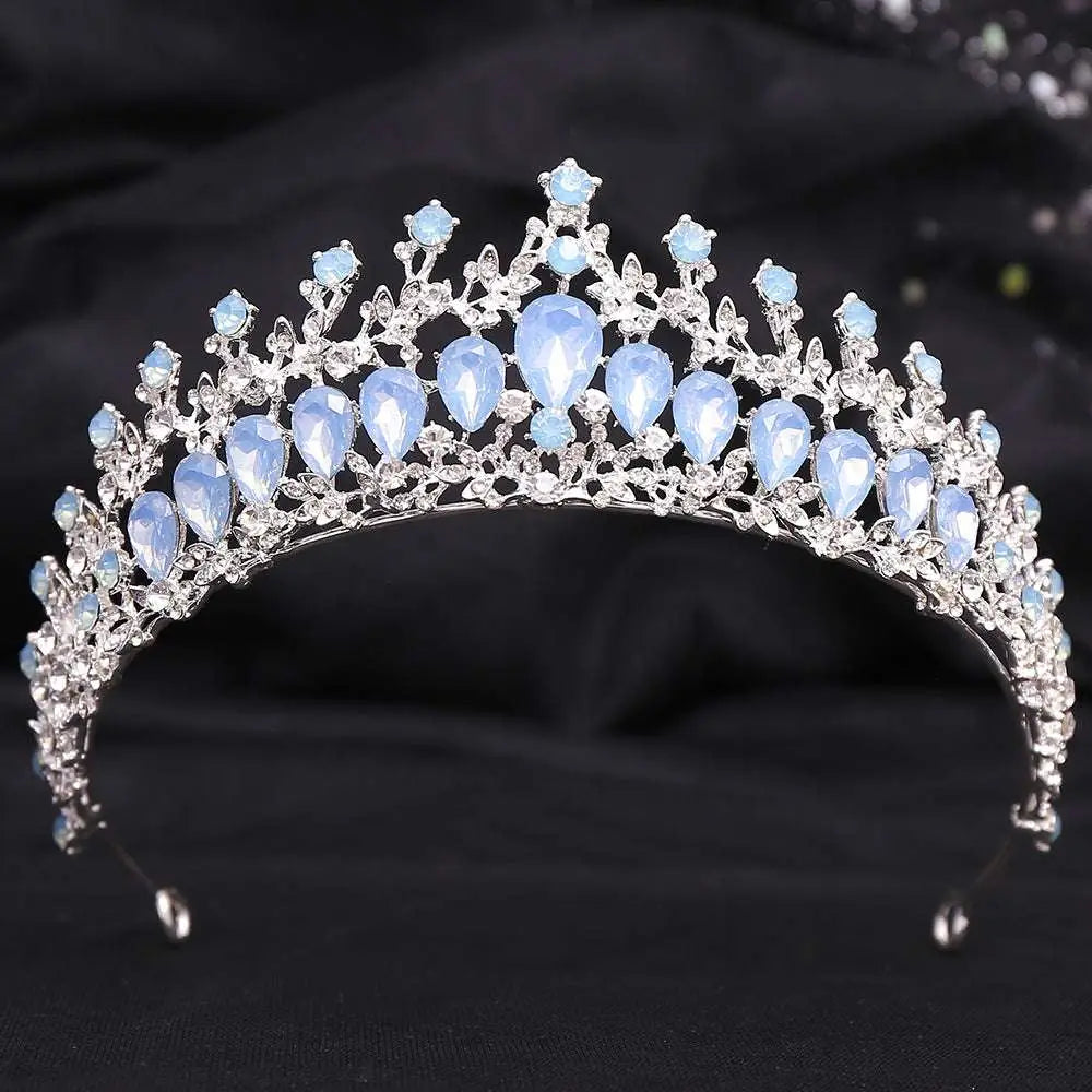 Silver white leafy opal and crystal bridal crown featuring a delicate silver tiara with light blue teardrop crystals and clear gemstones